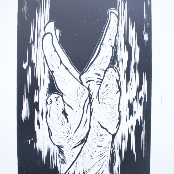 linoprint in black of two hands